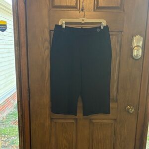 These black capris look very nice on.